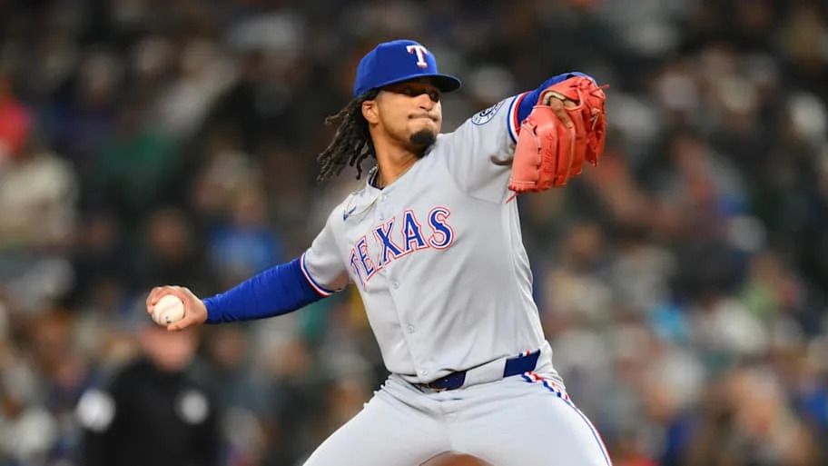 Texas Rangers relief pitcher Marc Church throws a baseball.