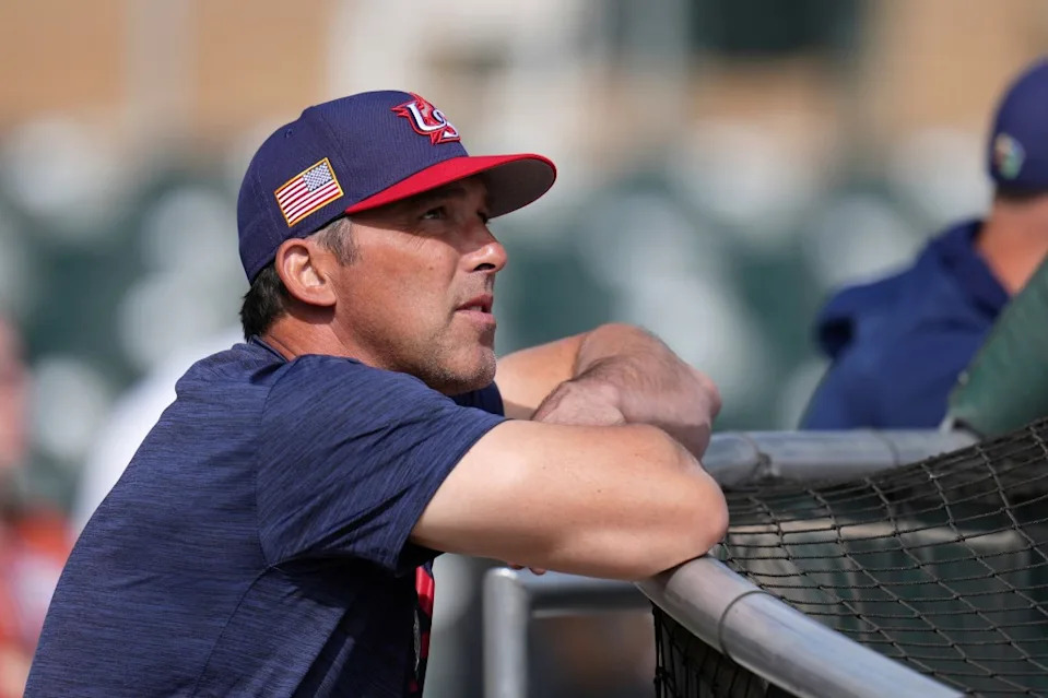 United States manager Mark DeRosa watches batting practice prior to an exhibition baseball game against the Colorado Rockies on Wednesday, March 4, 2026, in Scottsdale, Ariz. AP
