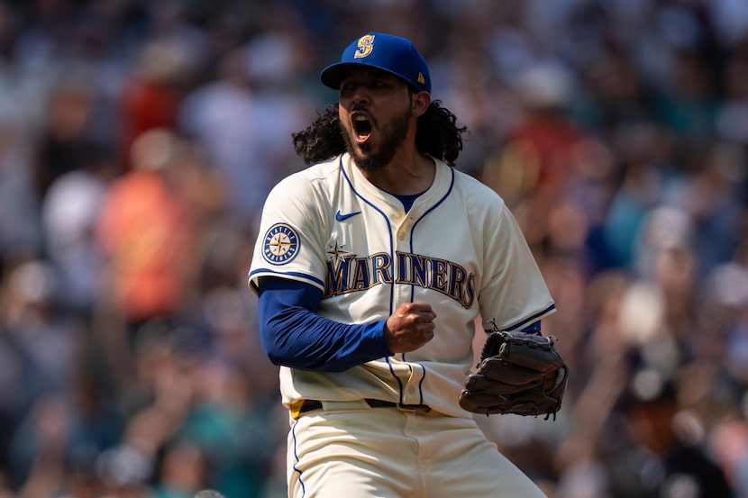 Seattle Mariners relief pitcher Andres Munoz celebrates after a a baseball game against the...