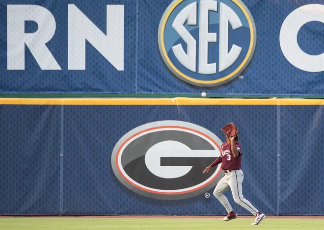Texas A&M Aggies' Terrence Kiel II (3) catches a fly ball as LSU Tigers take on Texas A&M Aggies during the SEC baseball tournament at Hoover Met in Birmingham, Ala., on Friday, May 23, 2025.