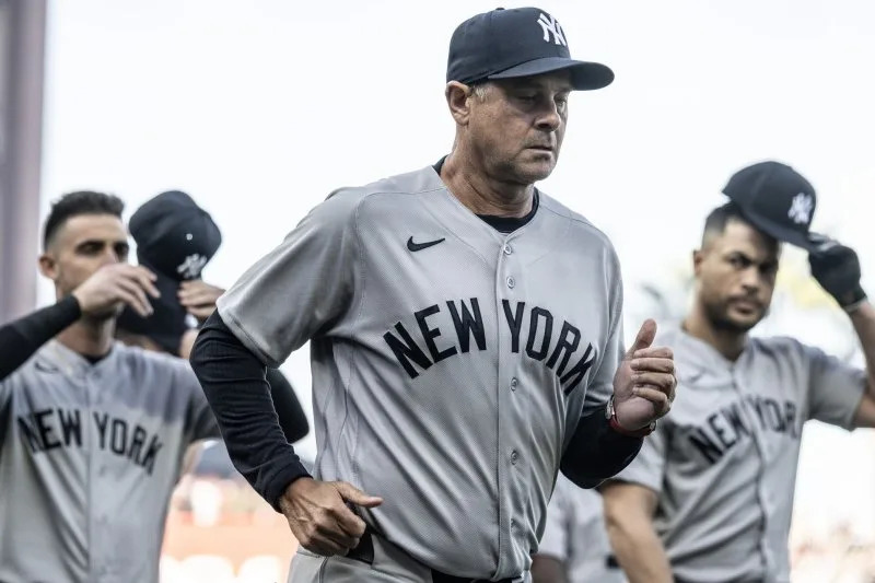 New York Yankees manager Aaron Boone heads to the dugout after introductions before playing the San Francisco Giants on Wednesday at Oracle Park in San Francisco. Photo by Terry Schmitt/UPI