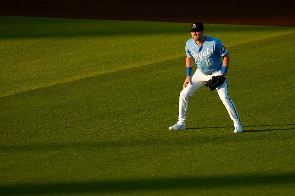 Kansas City Royals outfielder Lane Thomas (15) ready for a fly ball during an MLB spring training baseball game against the Los Angeles Dodgers on March 17th, 2026 in Surprise, AZ.