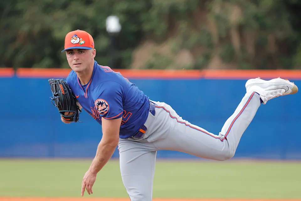 New York Mets pitcher Jonathan Santucci(12) throws a pitch during spring training workouts on Feb. 18, 2026, at Clover Park.