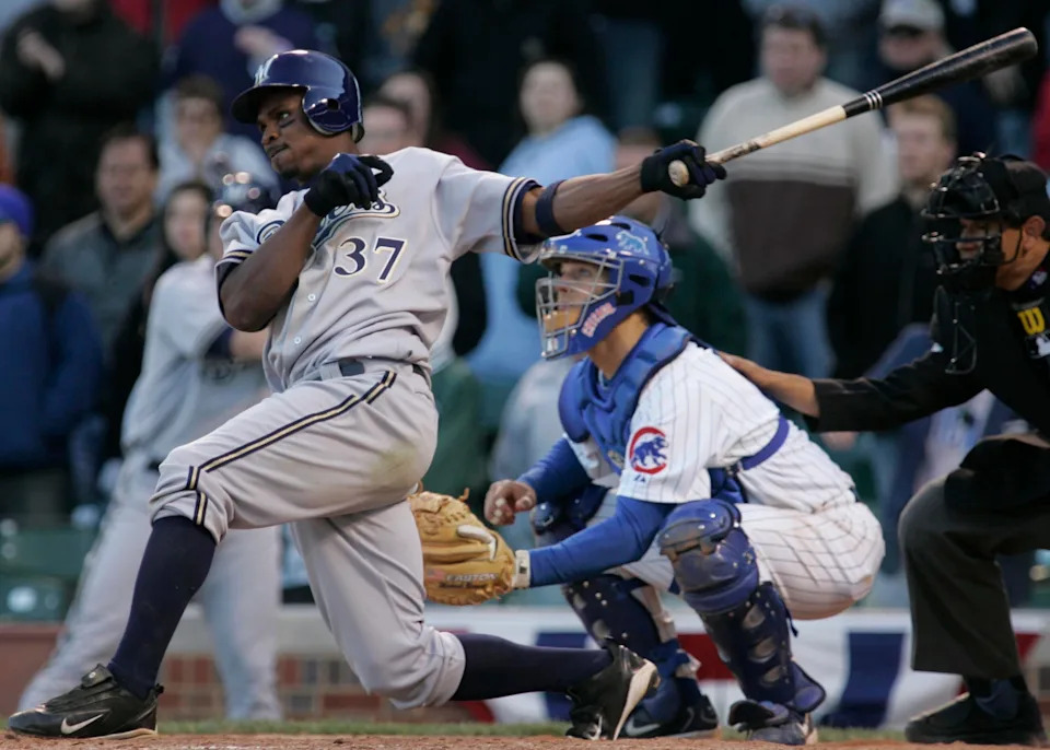 Milwaukee Brewers second baseman Junior Spivey delivers a two-run single for the winning hit in the 12th inning against the Chicago Cubs Friday, April 8, 2005.