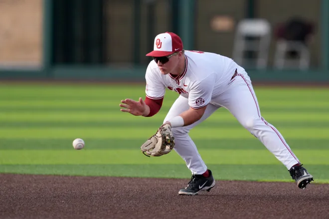 Oklahoma Sooners infielder Jaxon Willits (7) fields the ball in the fourth inning of a college baseball game between the University of Oklahoma (OU) and the Arizona State Sun Devils at Kimrey Family Stadium in Norman, Okla., Wednesday, Feb. 25, 2026.