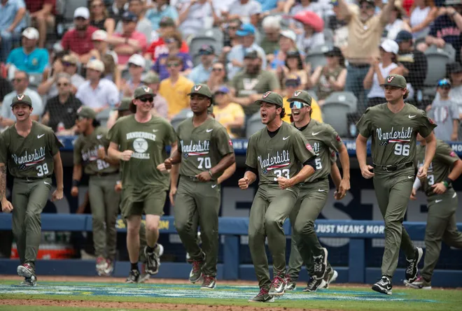 Vanderbilt Commodores players celebrate the end of an inning as Ole Miss Rebels take on Vanderbilt Commodores during the SEC baseball tournament championship game at Hoover Met in Birmingham, Ala., on Sunday, May 25, 2025. Vanderbilt Commodores defeated Ole Miss Rebels 3-2.