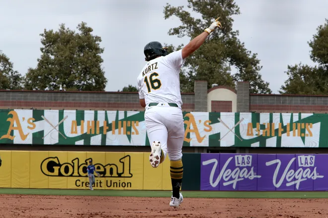 Athletics first baseman Nick Kurtz (16) reacts after hitting a two-run home run against the Kansas City Royals during the eighth inning at Sutter Health Park.