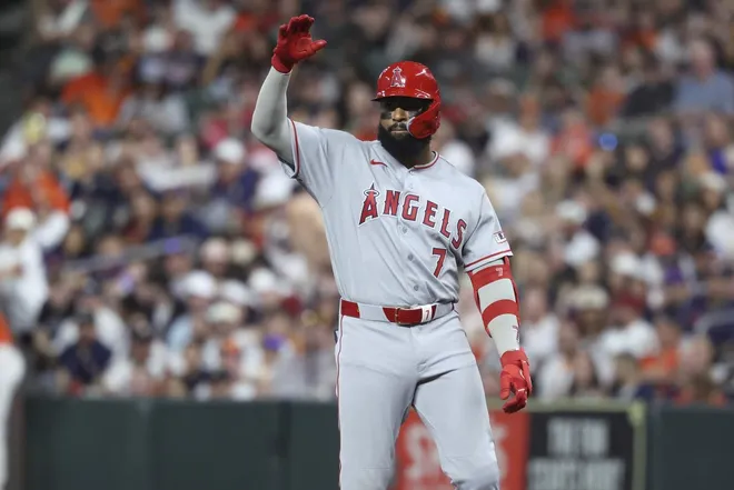 Mar 27, 2026; Houston, Texas, USA; Los Angeles Angels right fielder Jo Adell (7) reacts after hitting a single during the second inning against the Houston Astros at Daikin Park.