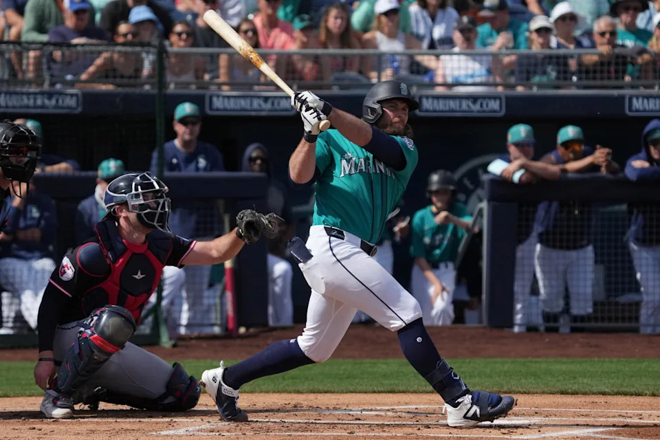 Seattle Mariners second baseman Brendan Donovan (33) bats against the Cleveland Guardians in the first inning at Peoria Sports Complex. Rick Scuteri-Imagn Images