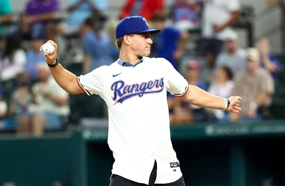 Texas Rangers first-round draft pick Gavin Fien throws out the ceremonial first pitch before a game against the Athletics at Globe Life Field on July 22, 2025.Kevin Jairaj-Imagn Images