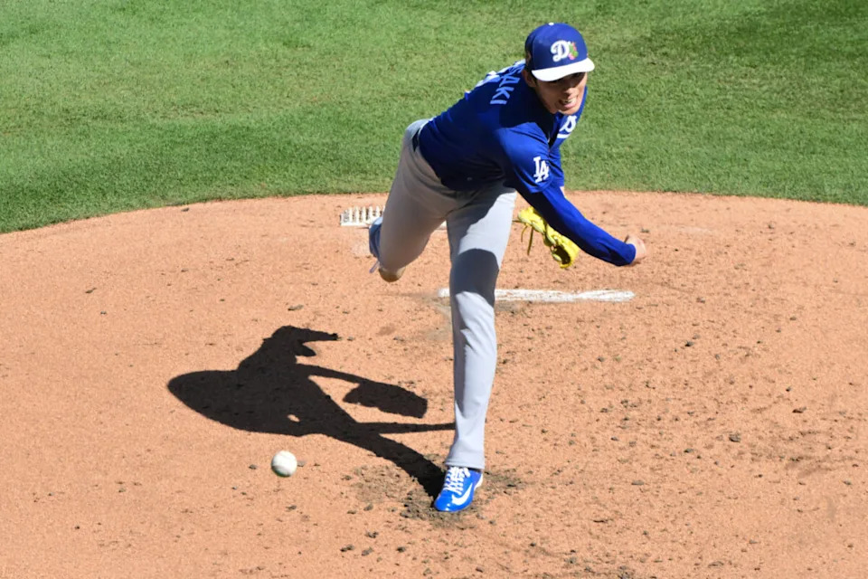 Feb 25, 2026; Salt River Pima-Maricopa, Arizona, USA; Los Angeles Dodgers pitcher Roki Sasaki (11) throws in the second inning against the Arizona Diamondbacks at Salt River Fields at Talking Stick. Mandatory Credit: Matt Kartozian-Imagn Images