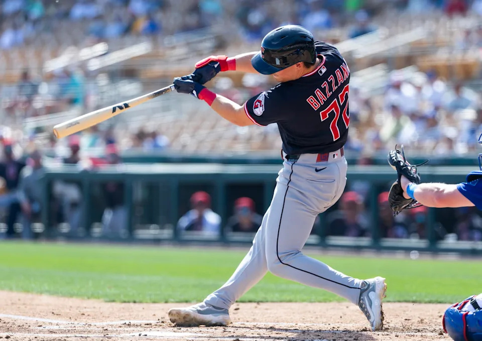 Feb 24, 2026; Phoenix, Arizona, USA; Cleveland Guardians second baseman Travis Bazzana hits a three run home run against the Los Angeles Dodgers during a spring training game at Camelback Ranch-Glendale. Mandatory Credit: Mark J. Rebilas-Imagn Images