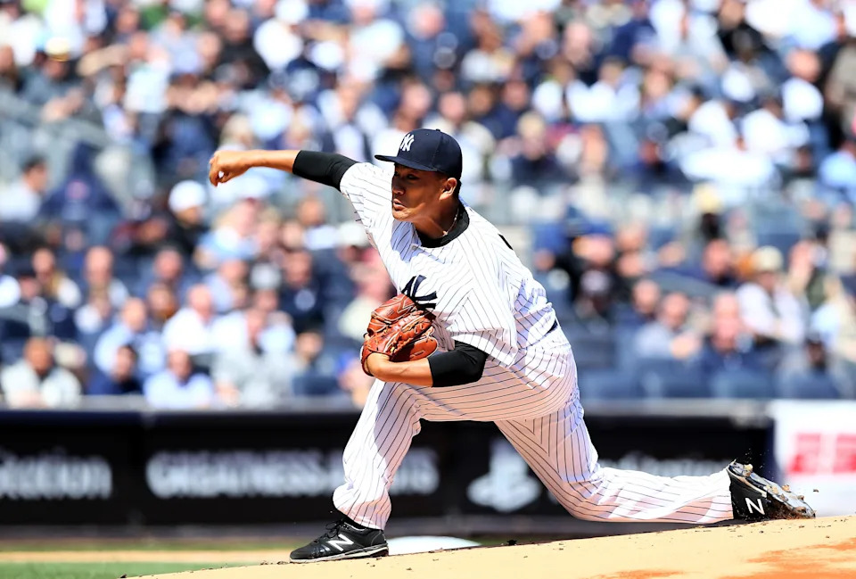 Masahiro Tanaka of the New York Yankees delivers a pitch in the first inning against the Toronto Blue Jays.
