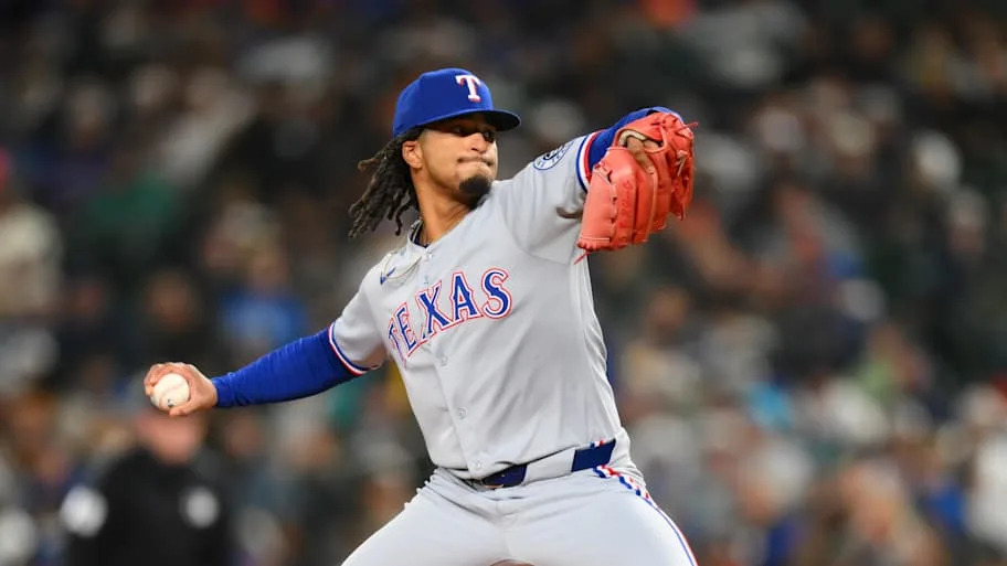 Texas Rangers relief pitcher Marc Church throws a baseball.