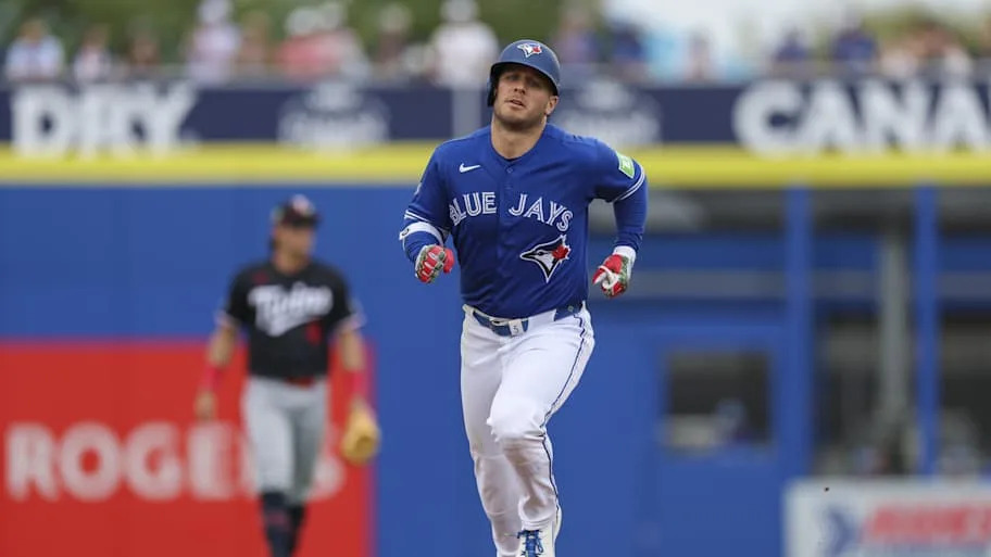 Toronto Blue Jays center fielder Daulton Varsho runs the bases.