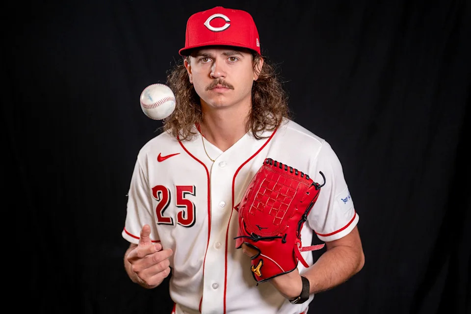 Cincinnati Reds pitcher Rhett Lowder (25) poses for a portrait during the Cincinnati Reds picture day, Tuesday, Feb. 17, 2026, at the Cincinnati Reds player development complex in Goodyear, Ariz.