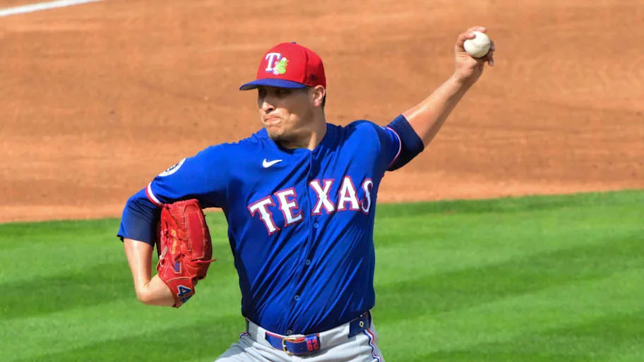 Texas Rangers pitcher Robert Garcia throws the baseball.