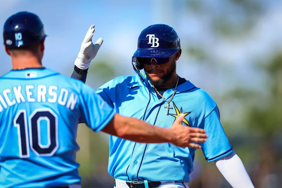 Xavier Isaac accepts congratulations from his first base coach after singling to right field in the eighth inning of the Rays’ 12-3 spring training loss to the Tigers on Feb. 26, 2026. Tampa Bay Rays/X