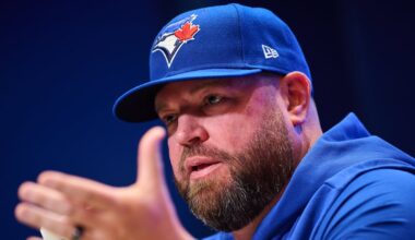 Toronto Blue Jays’ John Schneider gets reassurance from Golden State Warriors’ Steve Kerr