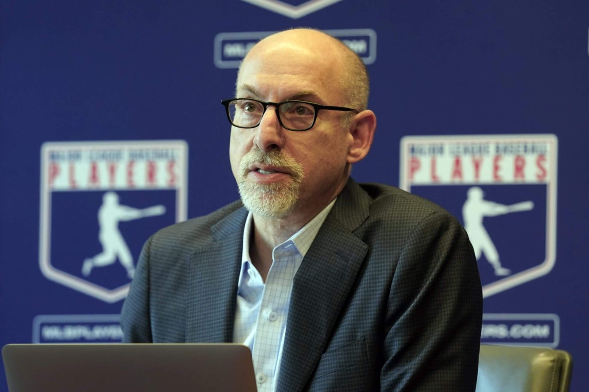 MLB poll says fans want a salary cap; union head thinks it would ultimately harm them