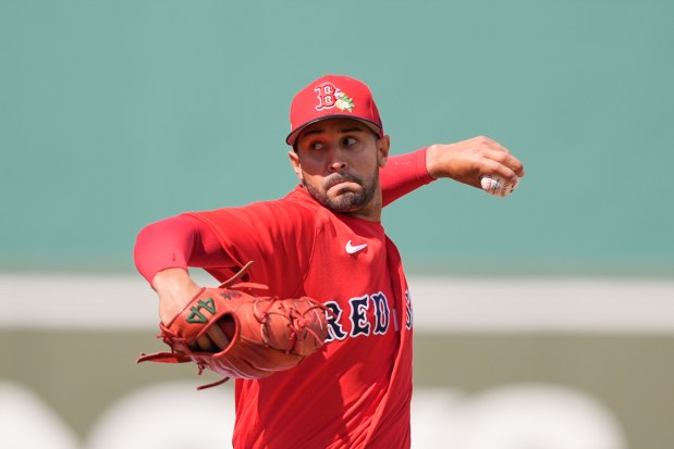 Boston Red Sox pitcher Jovani Moran delivers in the fifth inning of a spring training baseball game against the Tampa Bay Rays in Fort Myers, Fla., Thursday, Feb. 26, 2026. (AP Photo/Gerald Herbert)