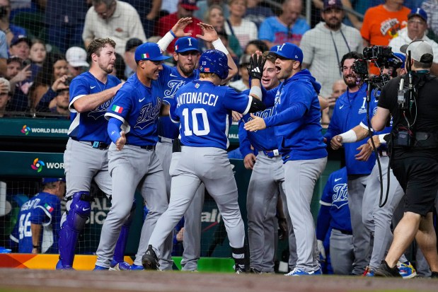 Italy shortstop Sam Antonacci (10) celebrates with teammates after a home run against the United States in the second inning of a World Baseball Classic game, Tuesday, March 10, 2026, in Houston. (AP Photo/Ashley Landis)