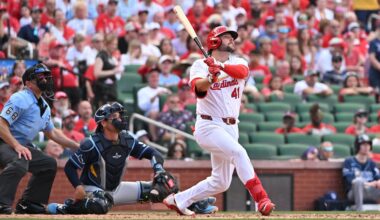 St. Louis Cardinals' Alec Burleson (41) watches the ball after hitting a homer against the Tampa Bay Rays during the sixth inning of an opening-day baseball game, Thursday, March 26, 2026, in St. Louis. (AP Photo/Jeff Le)