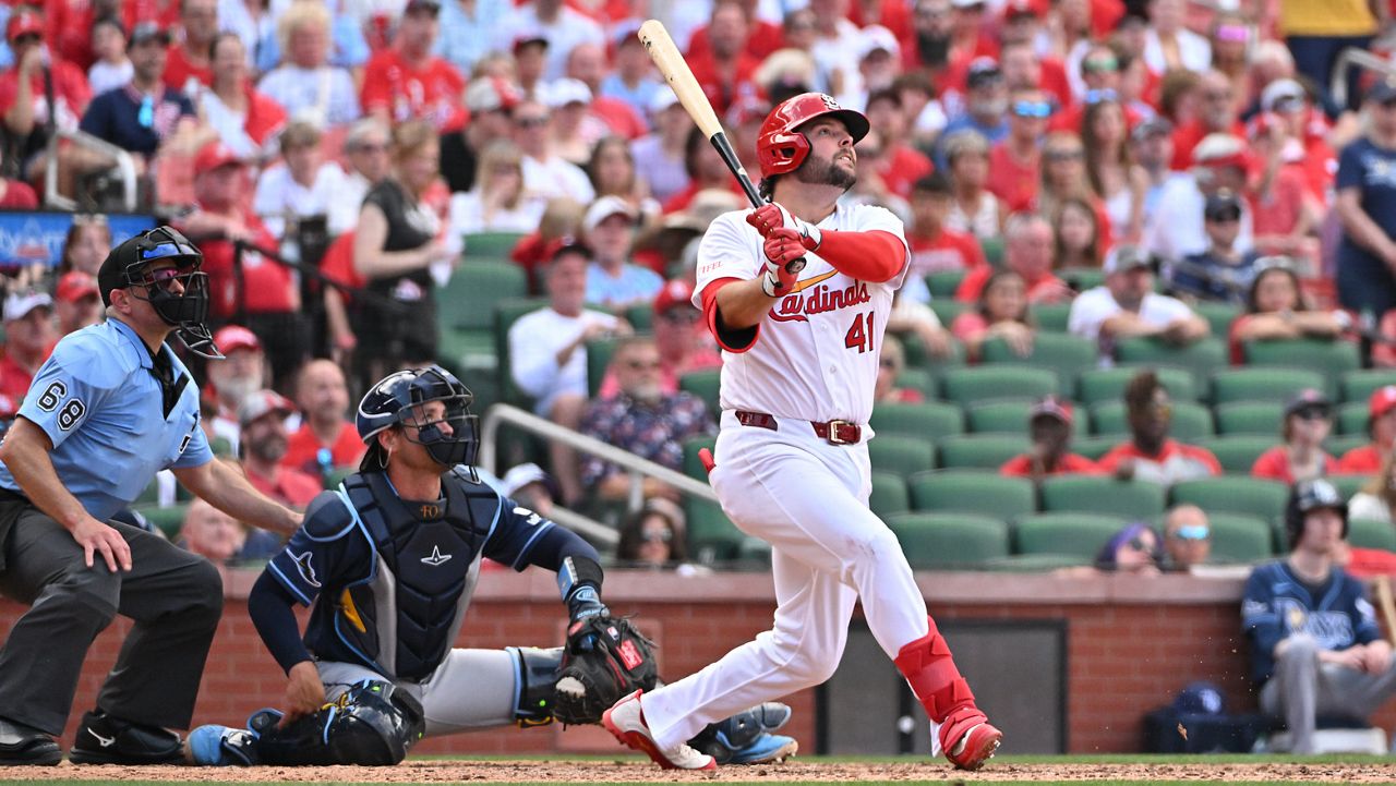 St. Louis Cardinals' Alec Burleson (41) watches the ball after hitting a homer against the Tampa Bay Rays during the sixth inning of an opening-day baseball game, Thursday, March 26, 2026, in St. Louis. (AP Photo/Jeff Le)