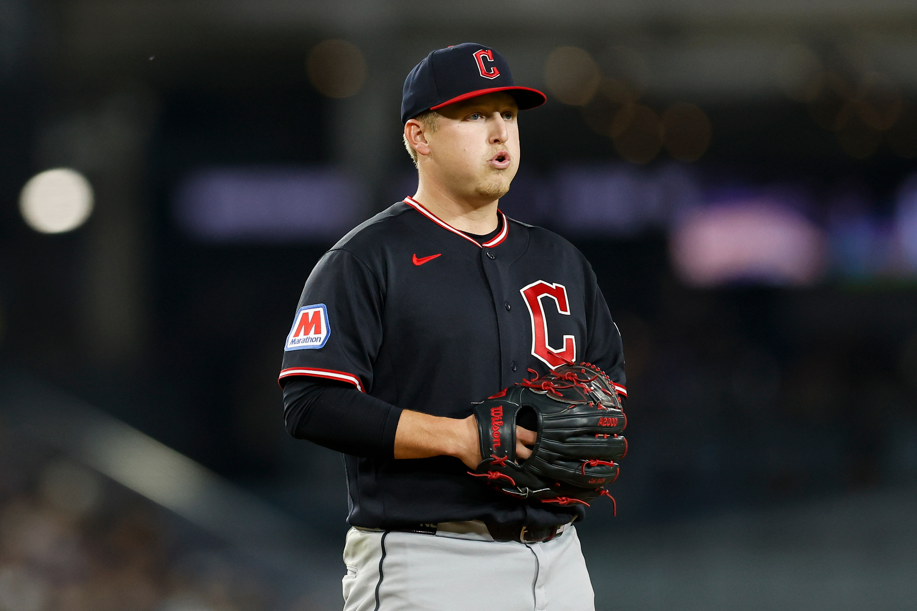 Cleveland Guardians starting pitcher Parker Messick takes a breath between...