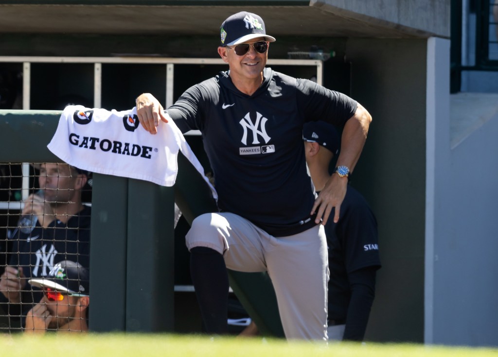 A smiling Aaron Boone looks on during the Yankees' 8-3 win over the Cubs in their spring training finale on March 24, 2026.