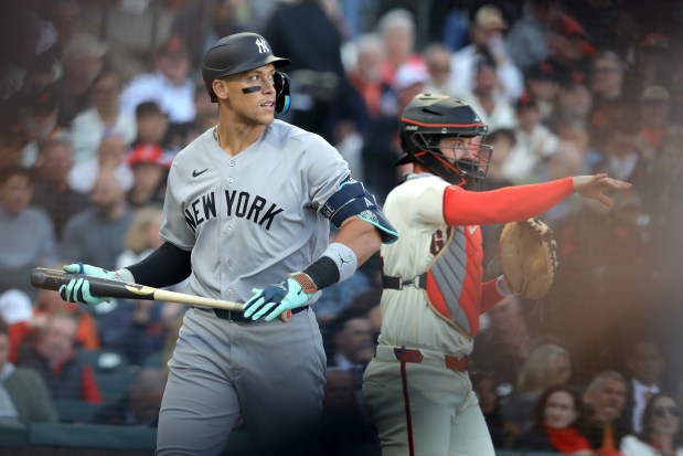New York Yankees' Aaron Judge (99) walks back to the dugout after striking out against San Francisco Giants pitcher Logan Webb (62) in the second inning of their opening night MLB game at Oracle Park in San Francisco, Calif., on Wednesday, March 25, 2026. (Ray Chavez/Bay Area News Group)