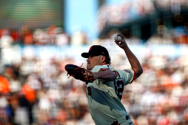 San Francisco Giants' Logan Webb (62) pitches against the New York Yankees in the first inning during Opening Night at Oracle Park in San Francisco, Calif., on Wednesday, March 25, 2026.  (Shae Hammond/Bay Area News Group)
