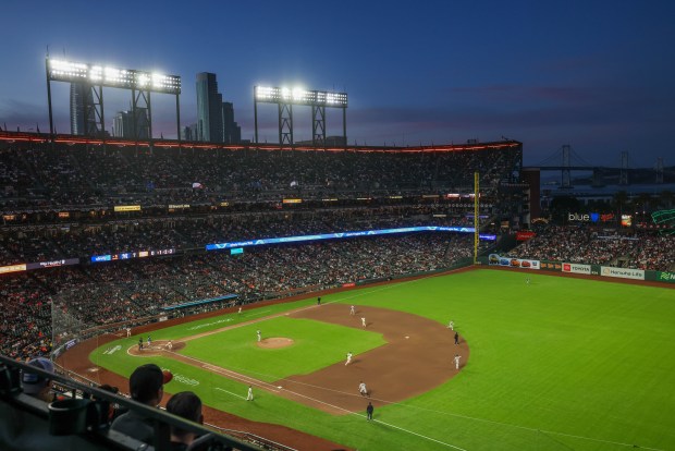 The San Francisco Giants and New York Yankees play in the eighth inning of their opening night MLB game at Oracle Park in San Francisco, Calif., on Wednesday, March 25, 2026. (Ray Chavez/Bay Area News Group)