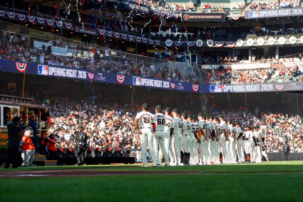 Streamers fall before the National Anthem during Opening Night against the New York Yankees at Oracle Park in San Francisco, Calif., on Wednesday, March 25, 2026. (Shae Hammond/Bay Area News Group)