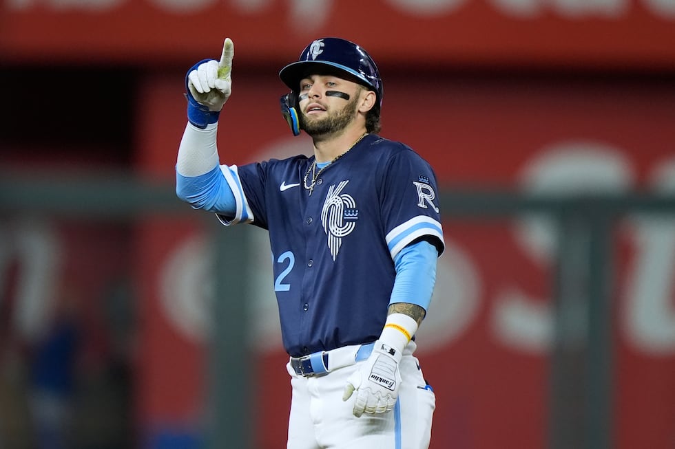Kansas City Royals' Carter Jensen celebrates on second after hitting a two-run double during...