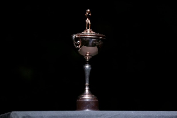 The 1939 NCAA men's basketball championship trophy is seen before the start of an NCAA college basketball game between UCLA and Oregon on Jan. 23, 2016, in Eugene, Oregon. (Ryan Kang/AP)