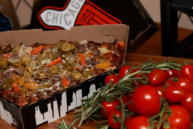 South Side Supreme, Beggars home plate shaped pizza topped with sausage, Buona Italian beef, peppers, onions and giardiniera on display, as the Chicago White Sox hold a media preview to showcase new food and beverage highlights at Rate Field, Wednesday, March 18, 2026. (Antonio Perez/Chicago Tribune)