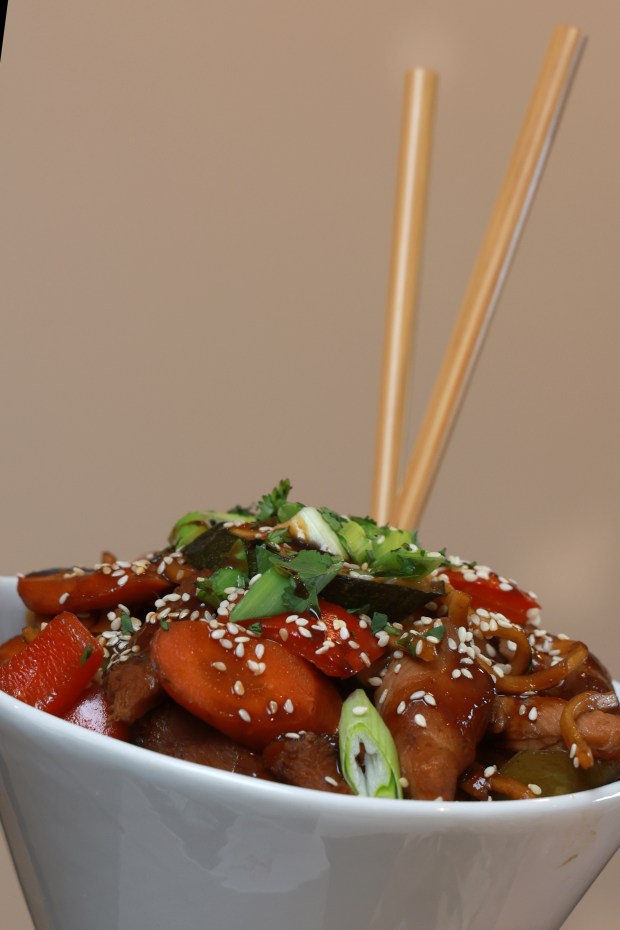 Street Wok, wok-fried chicken and vegetable Lo Mein in sweet and tangy sauce, on display, as the Chicago White Sox hold a media preview to showcase new food and beverage highlights at Rate Field, Wednesday, March 18, 2026. (Antonio Perez/Chicago Tribune)