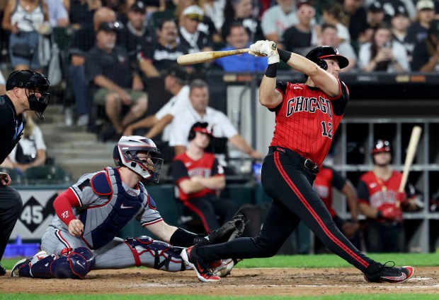 Chicago White Sox shortstop Colson Montgomery hits a two-run home run in the fifth inning of a game against the Minnesota Twins at Rate Field in Chicago on Aug. 22, 2025. (Chris Sweda/Chicago Tribune)
