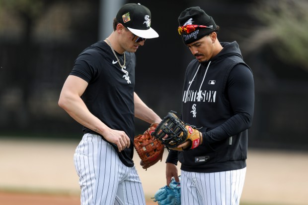 Chicago White Sox shortstop Colson Montgomery, left, speaks to third baseman Miguel Vargas during spring training at Camelback Ranch in Glendale, Ariz., on Wednesday, Feb. 18, 2026. (Eileen T. Meslar/Chicago Tribune)