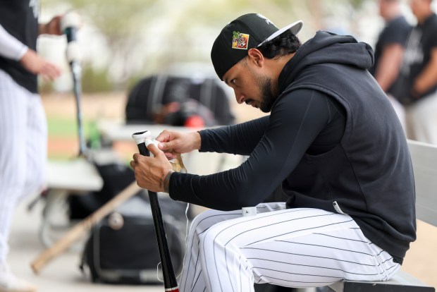Chicago White Sox's Everson Pereira tapes his bat outside the batting cages during spring training at Camelback Ranch in Glendale, Ariz., on Monday, Feb. 16, 2026. (Eileen T. Meslar/Chicago Tribune)