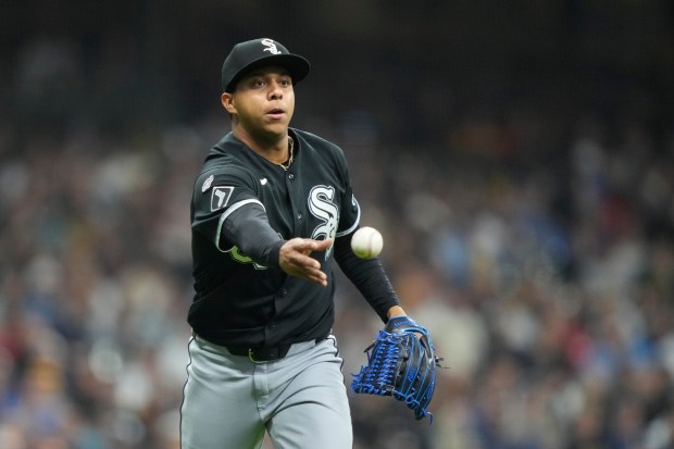White Sox reliever Jedixson Páez tosses the ball to first base forcing out the Brewers' Luis Rengifo during the sixth inning Thursday, March 26, 2026, in Milwaukee. Paez made his major-league debut. (Kayla Wolf/AP)