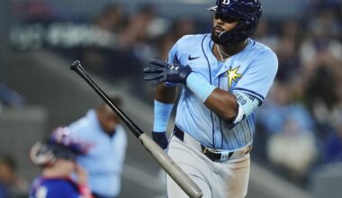 Tampa Bay Rays' Junior Caminero (13) celebrates his grand slam against the Toronto Blue Jays during ninth inning MLB baseball action in Toronto on Tuesday, May 13, 2025. (Nathan Denette/The Canadian Press via AP)
