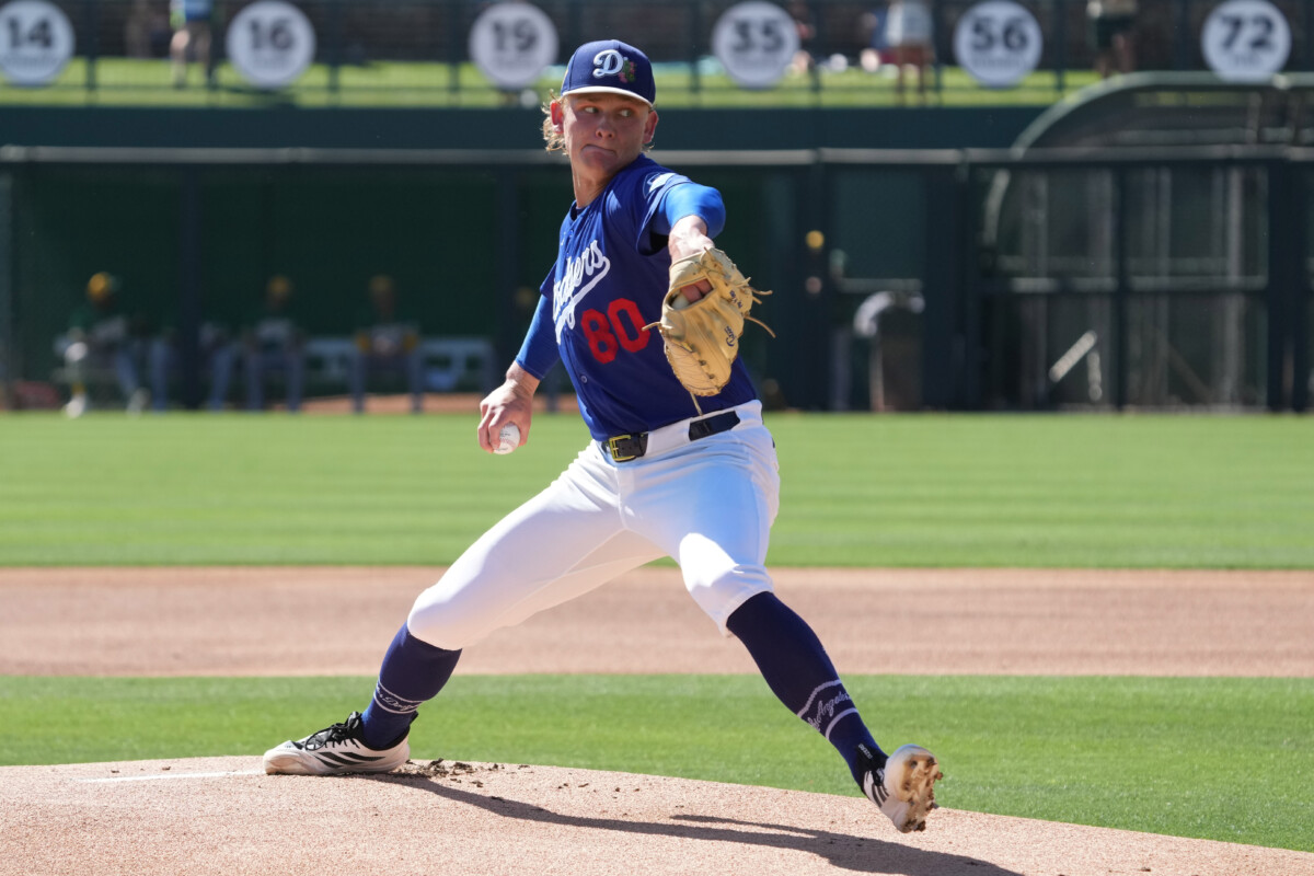 Los Angeles Dodgers pitcher Emmet Sheehan (80) throws against the Athletics in the first inning at Camelback Ranch-Glendale.