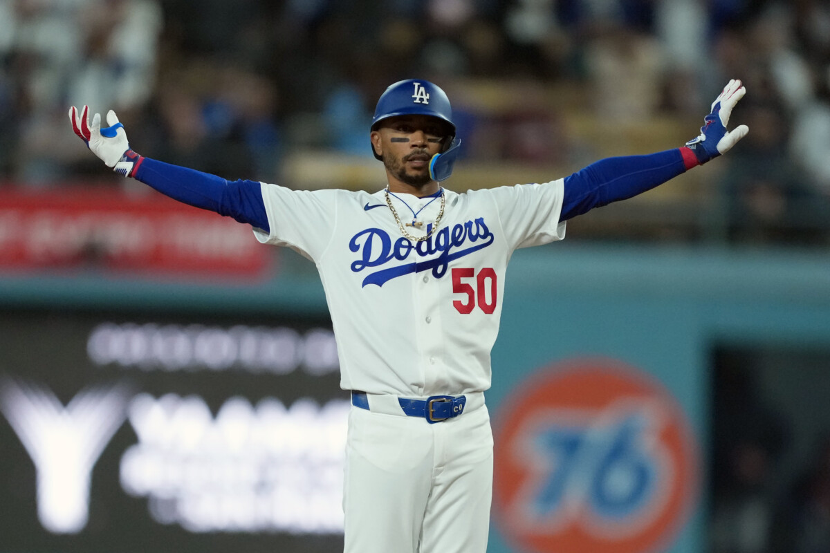 Mar 30, 2026; Los Angeles, California, USA; Los Angeles Dodgers shortstop Mookie Betts (50) celebrates after hitting a double against the Cleveland Guardians in the ninth inning at Dodger Stadium. Mandatory Credit: Kirby Lee-Imagn Images