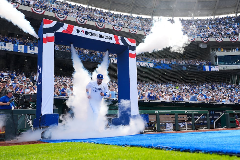 Kansas City Royals first baseman Vinnie Pasquantino runs onto the field before a baseball game...