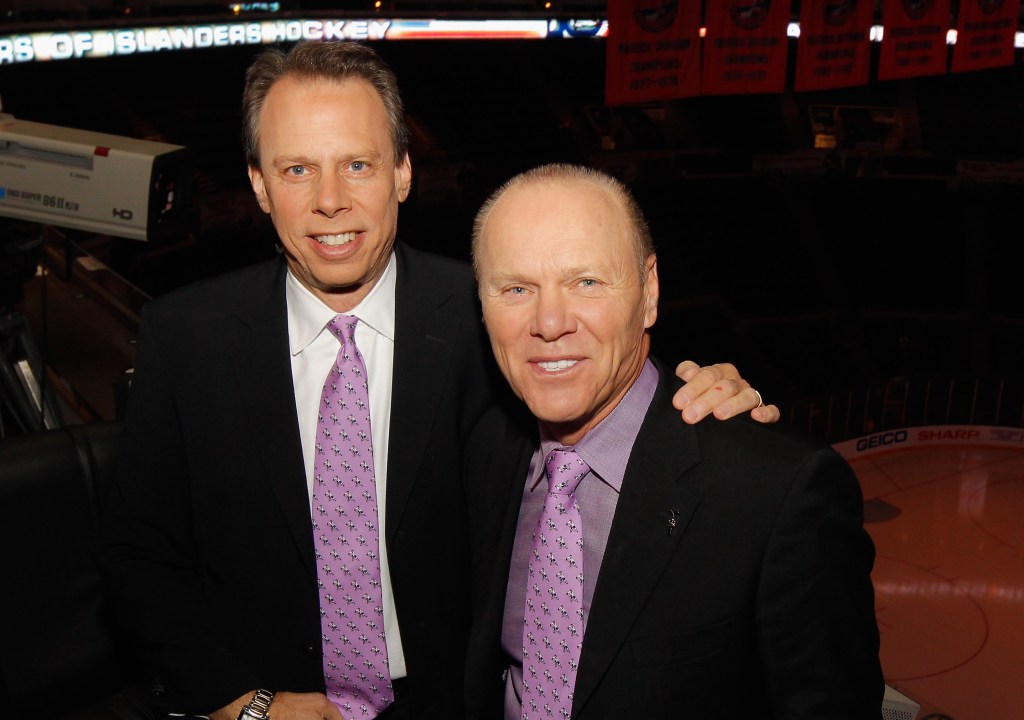Howie Rose (l.) is pictured before an Islanders game in October 2011.
