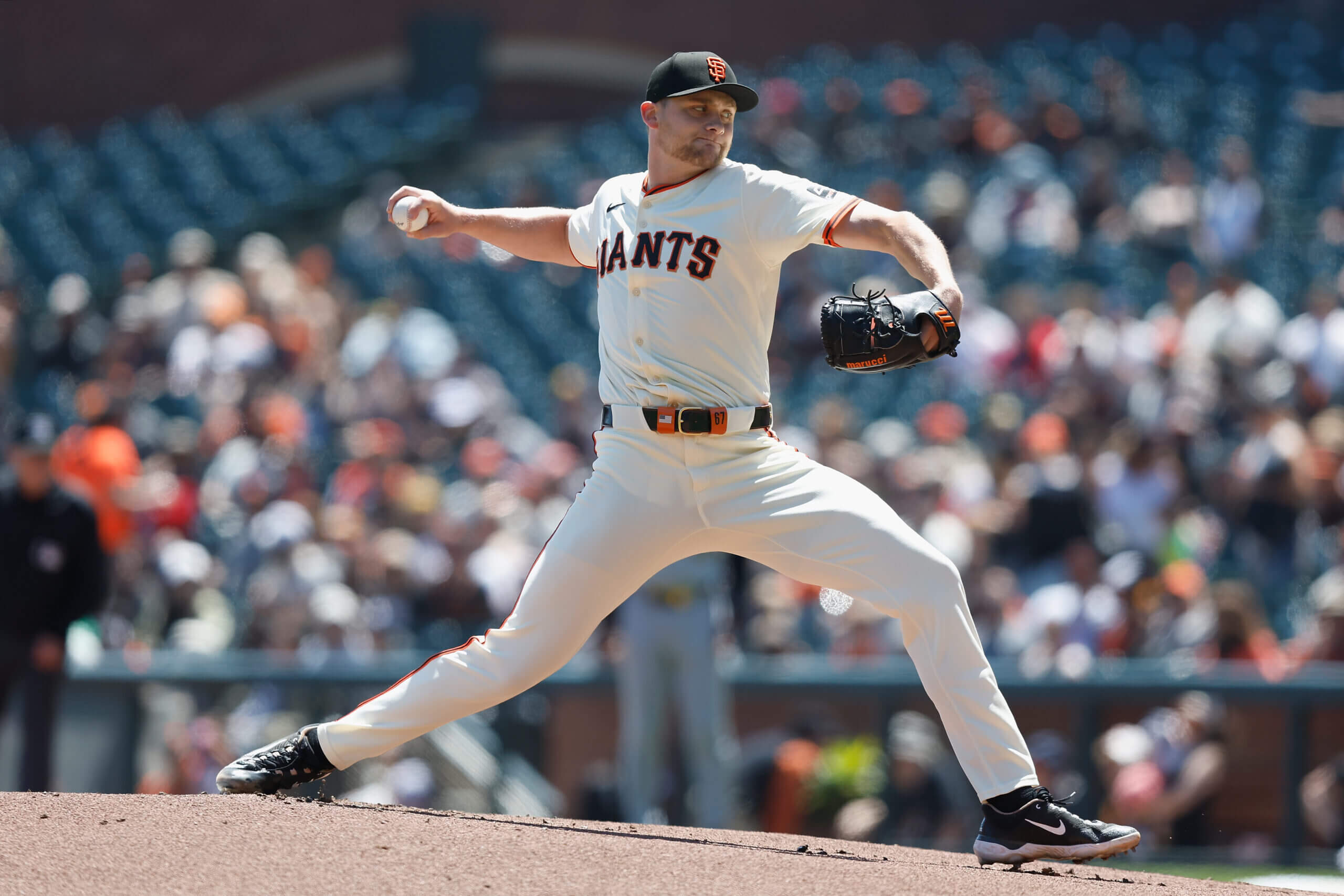 Keaton Winn #67 of the San Francisco Giants pitches in the top of the first inning against the Pittsburgh Pirates at Oracle Park on April 28, 2024 in San Francisco, California. 