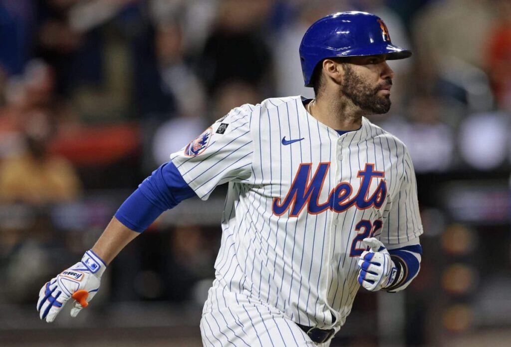 J.D. Martinez of the New York Mets watches his three run home run.