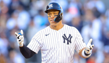 Aaron Judge #99 of the New York Yankees reacts after hitting a an RBI double in the seventh inning against the Milwaukee Brewers on Opening Day at Yankee Stadium on March 27, 2025 in New York City.